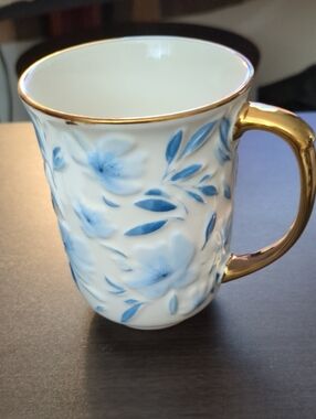 Papyrus White Porcelain Mug with Blue Floral Pattern and Gold Handle